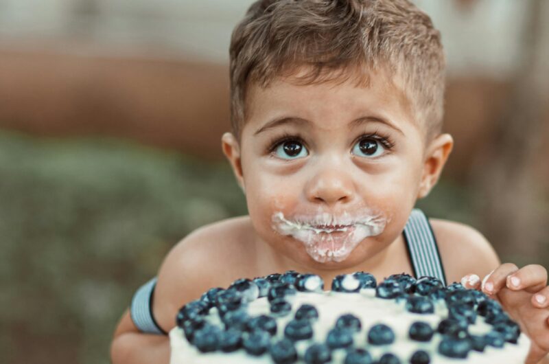 Cute Child Eating Cake